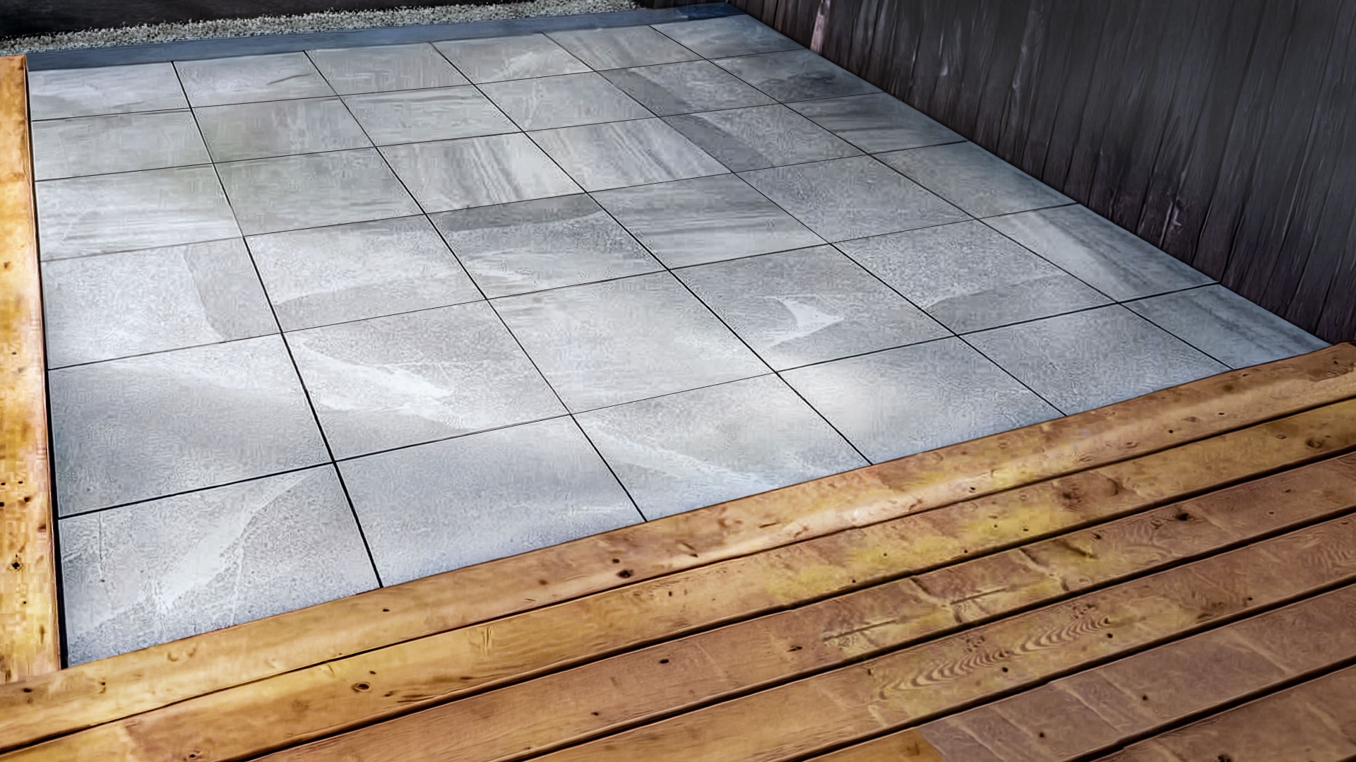 Port Moody — finished pedestal-set slab patio framed by cedar deck steps
