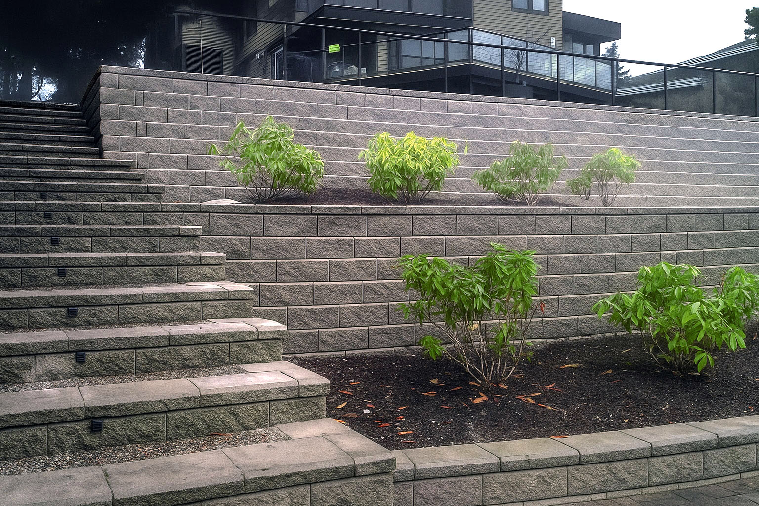 Mid-tier staircase and planter detail with new shrubs