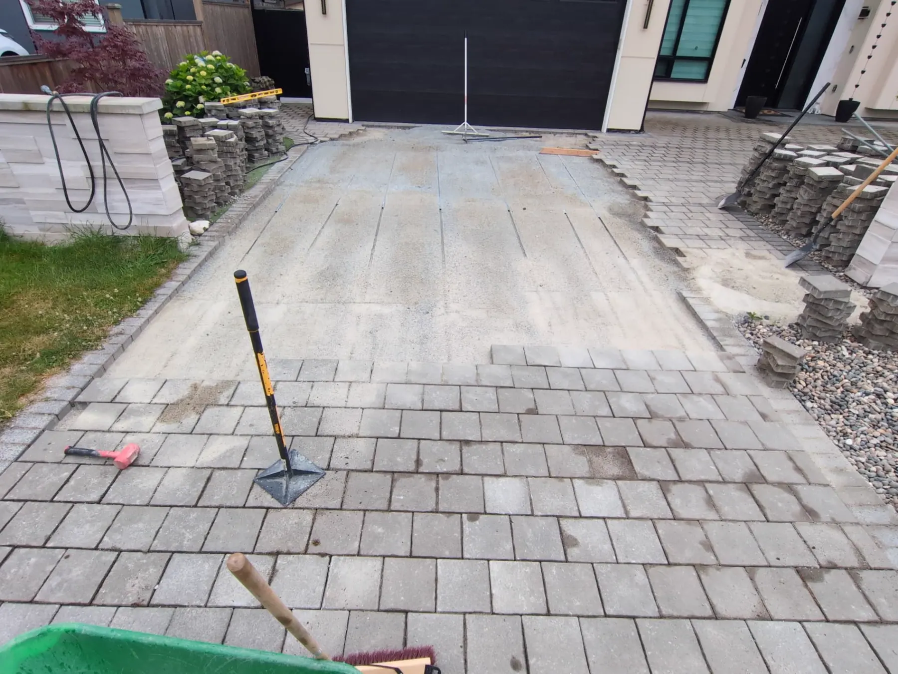 Screed rails dug into the rockdust base